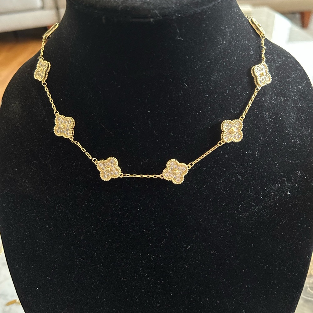 Gold & crystal 10 motif necklace